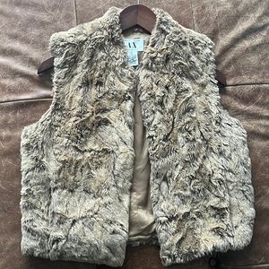 Armani Exchange vest. It’s gorgeous, but is too small on me! Perfect condition